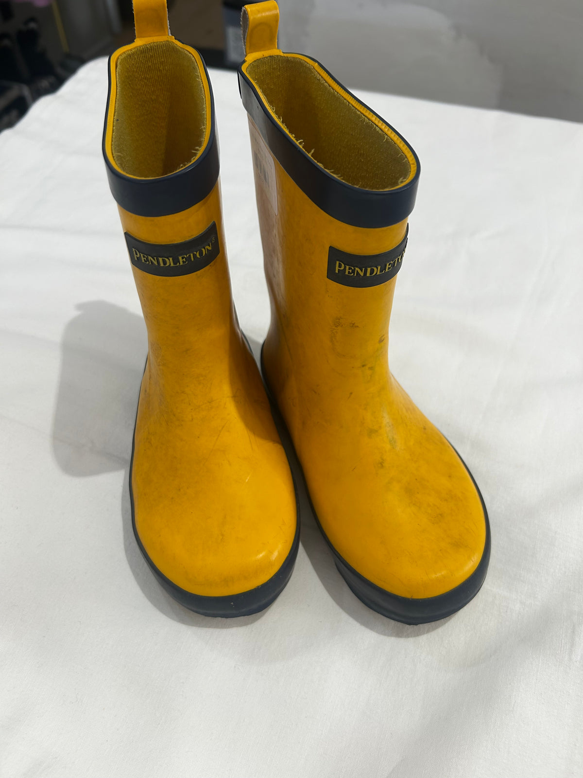 C10 Yellow and navy rain boots