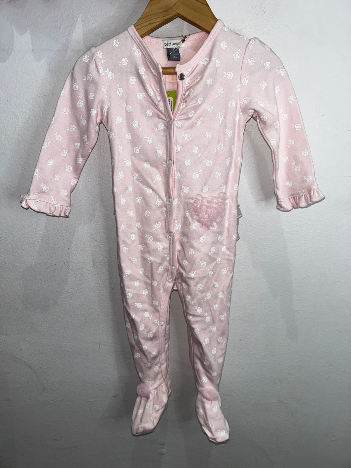 Very frilly pink sleeper 9m NEW