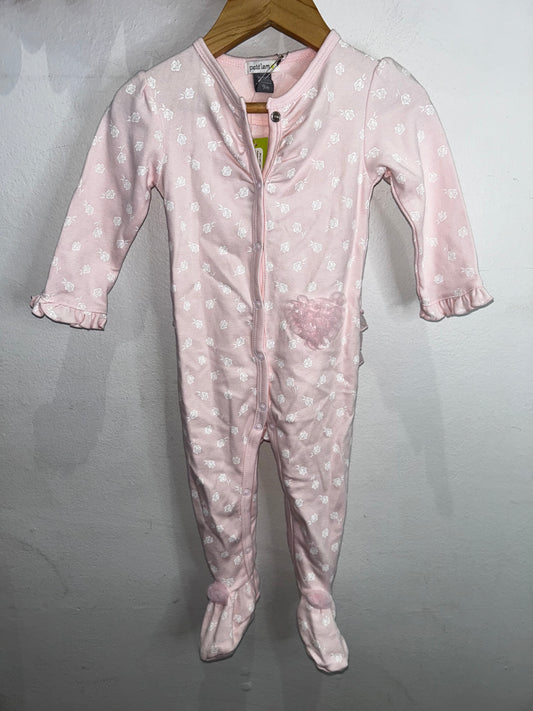 Very frilly pink sleeper 9m NEW