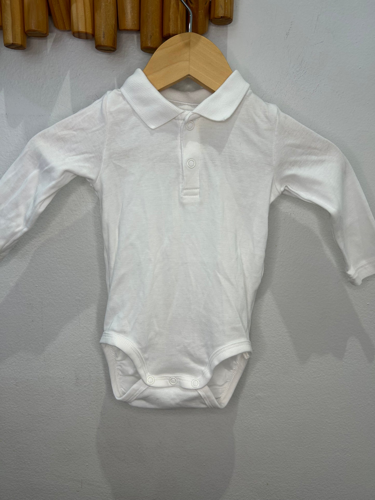 White polo onesie 4-6m