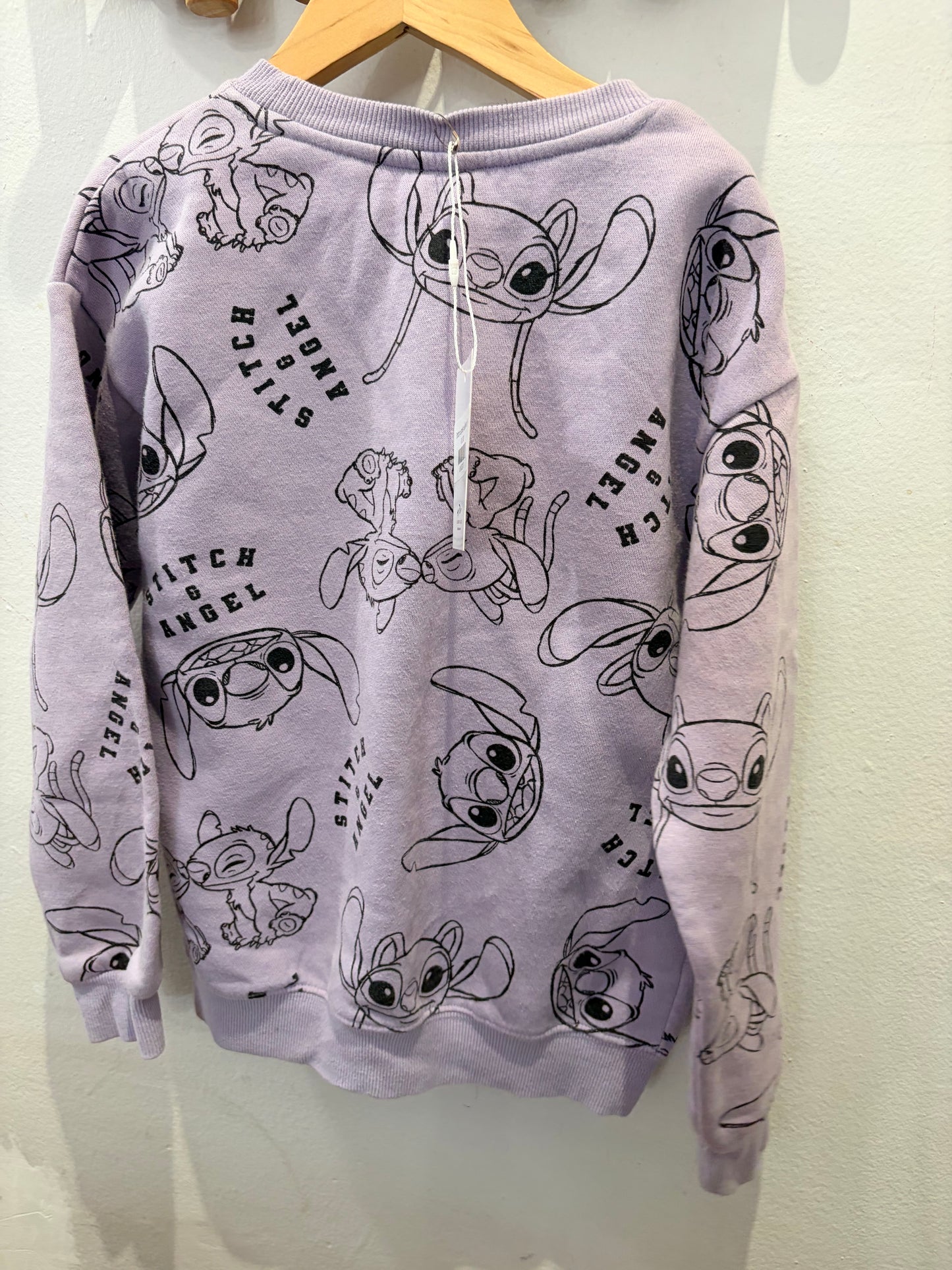 Stitch purple pullover 7y