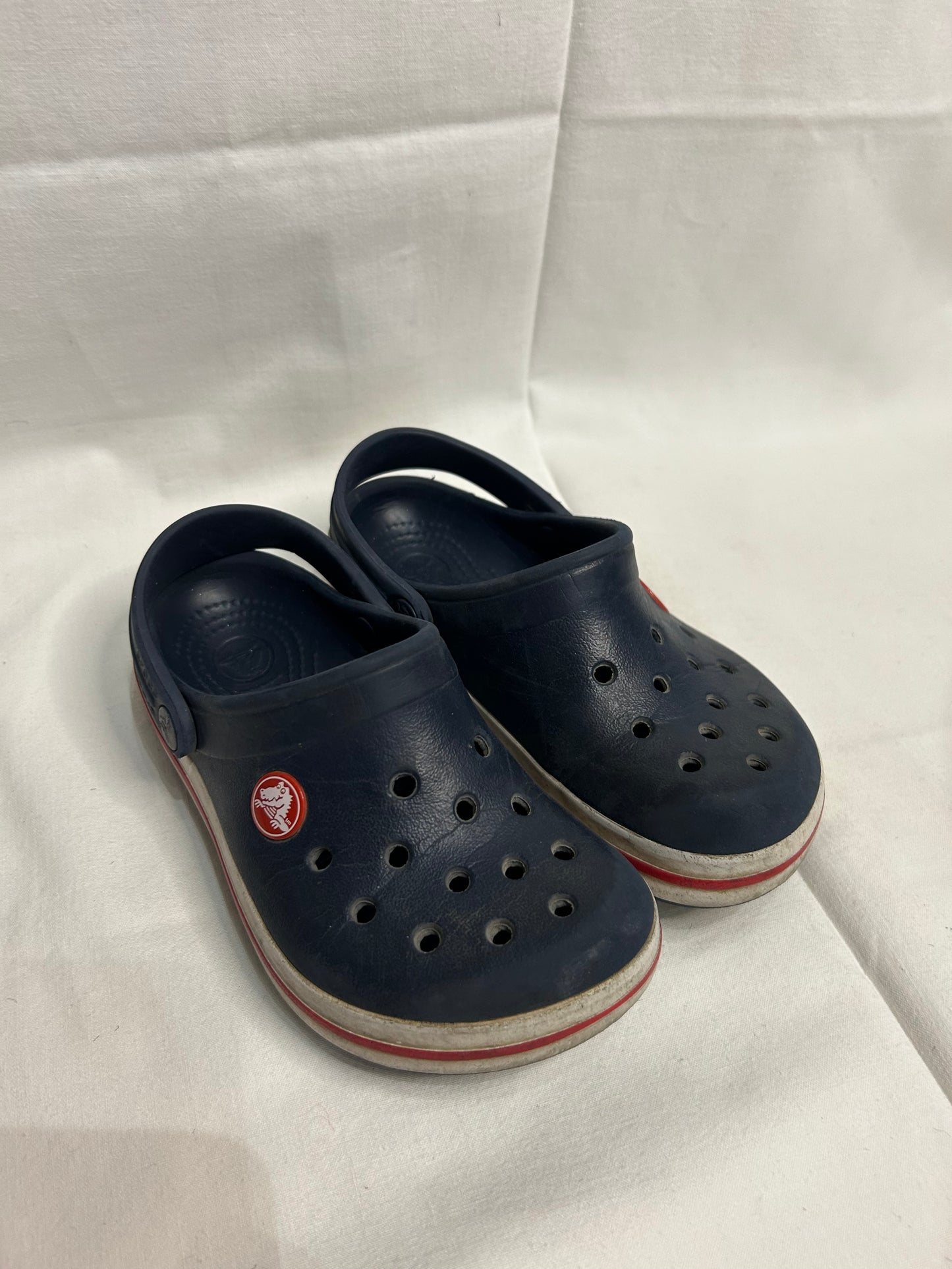 C10-11 blue and red Crocs