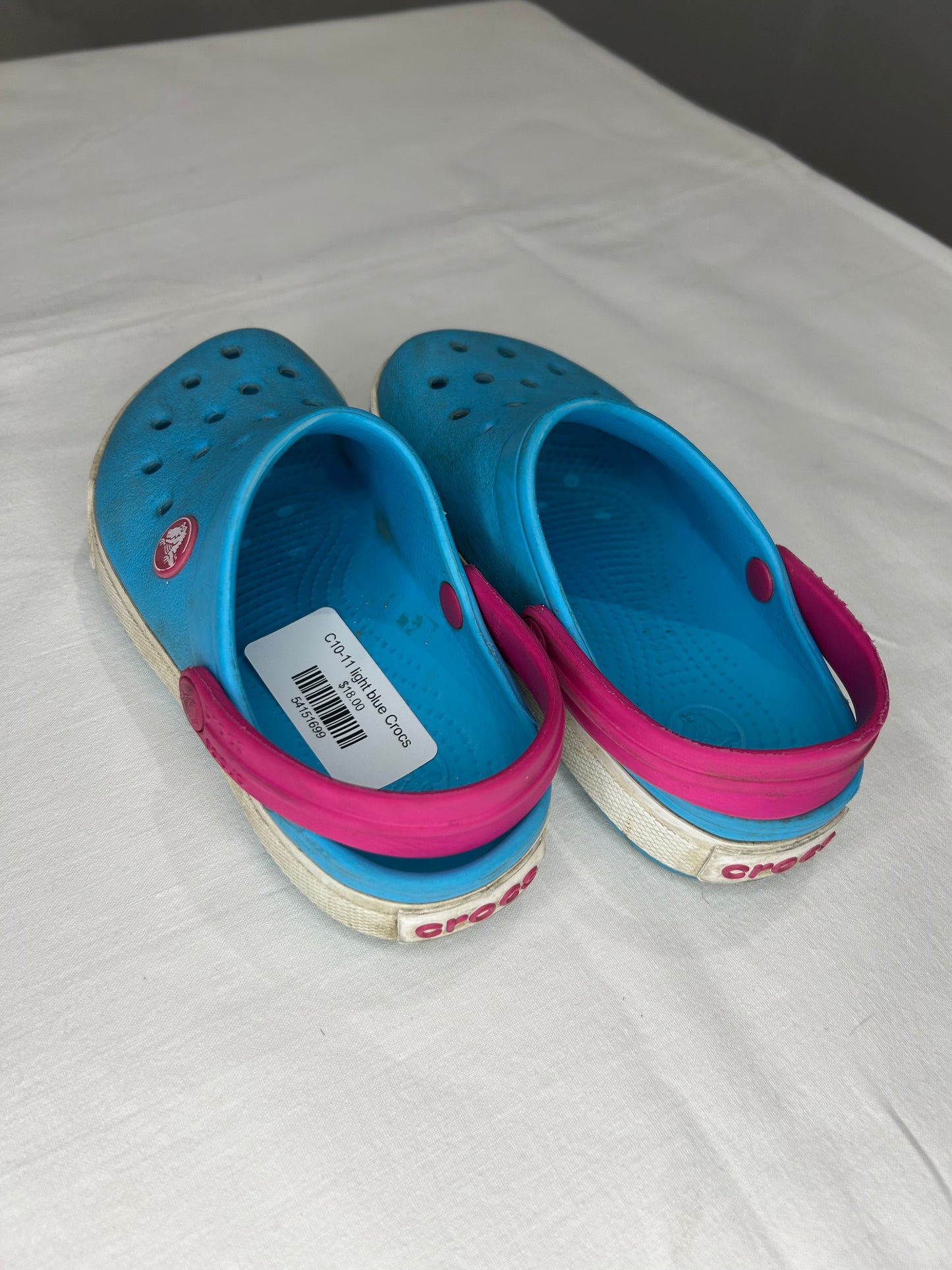 C10-11 light blue Crocs