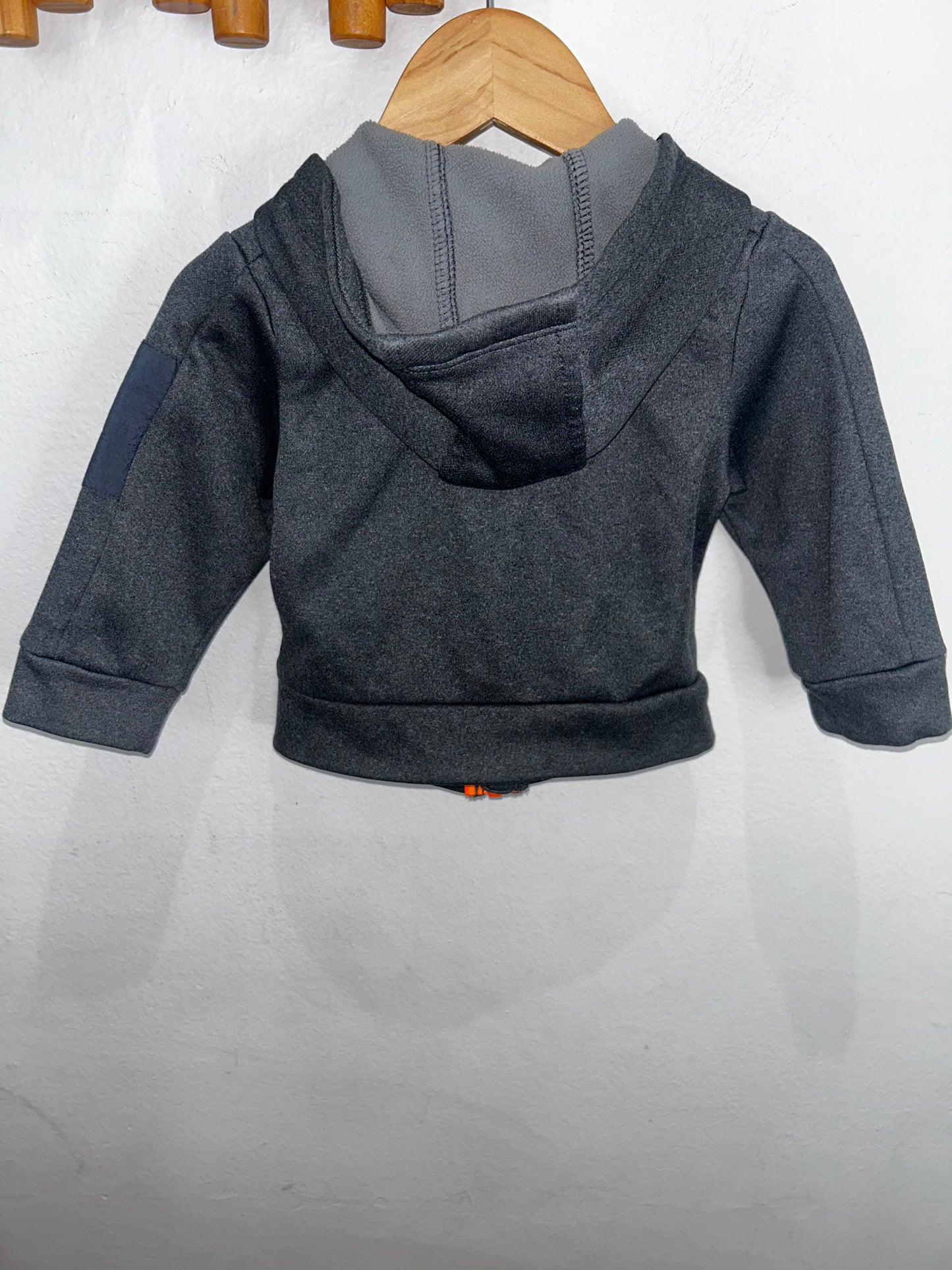 Black and orange zip-up 12m