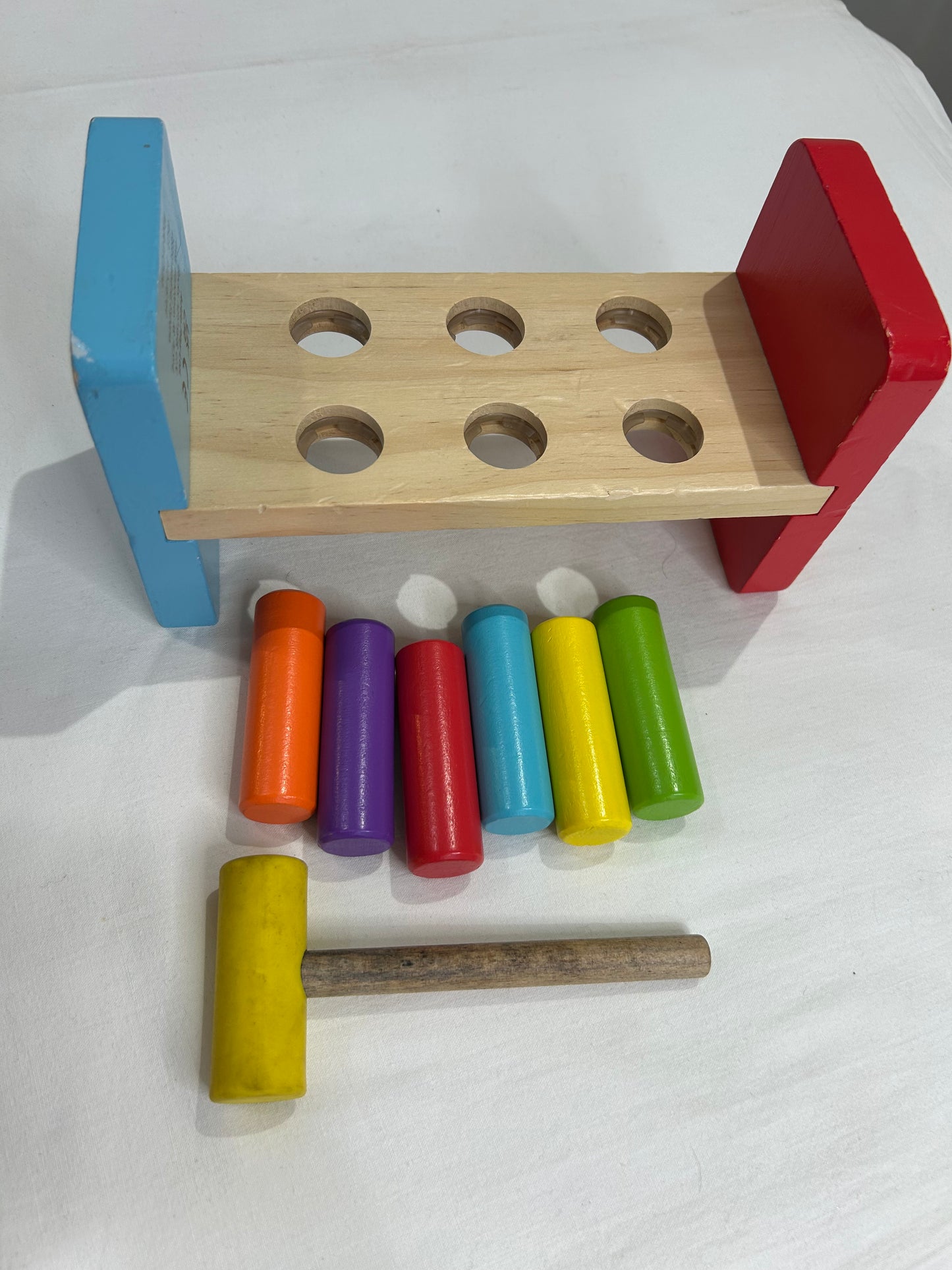 Pounding bench with hammer