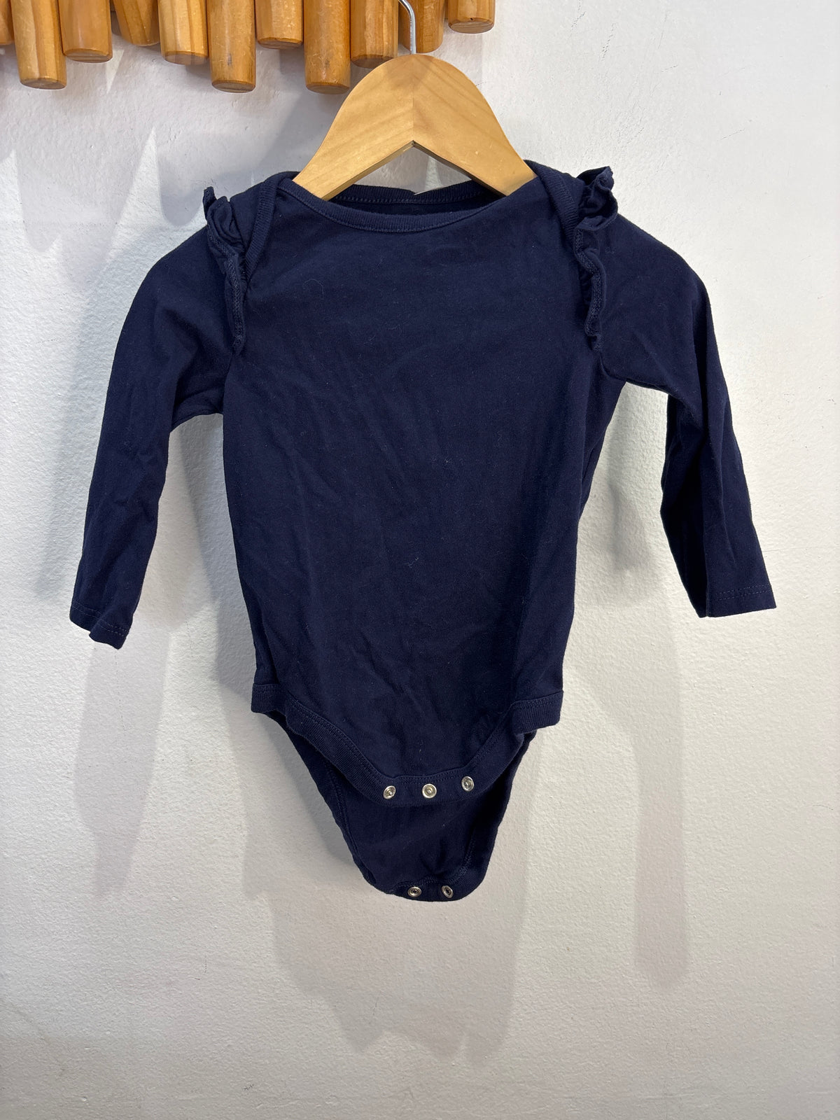 Frilly sleeve navy onesie 6-12m
