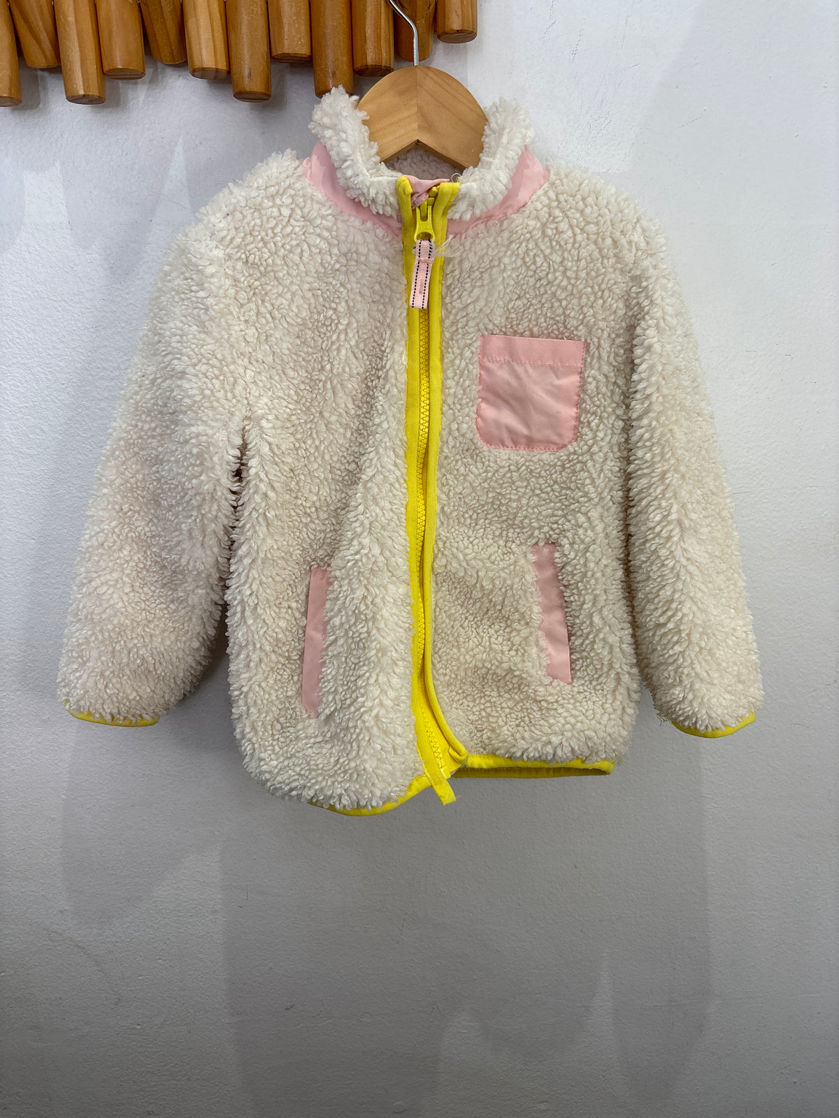 Pink and yellow trim teddy 2-3y